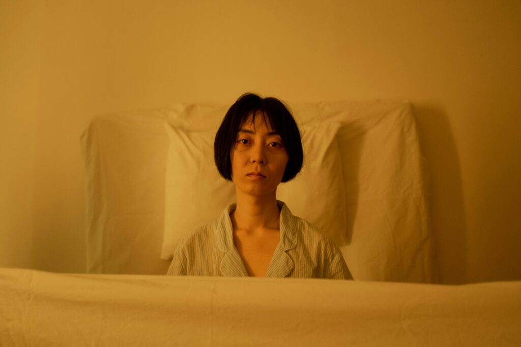 A woman who's having a disturb sleeping pattern
