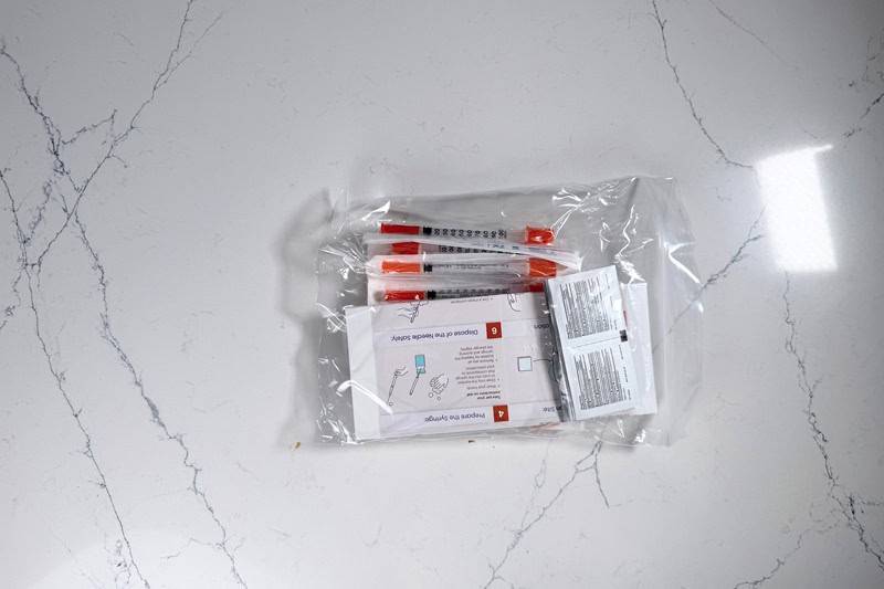 Included injection supplies and instructions.
